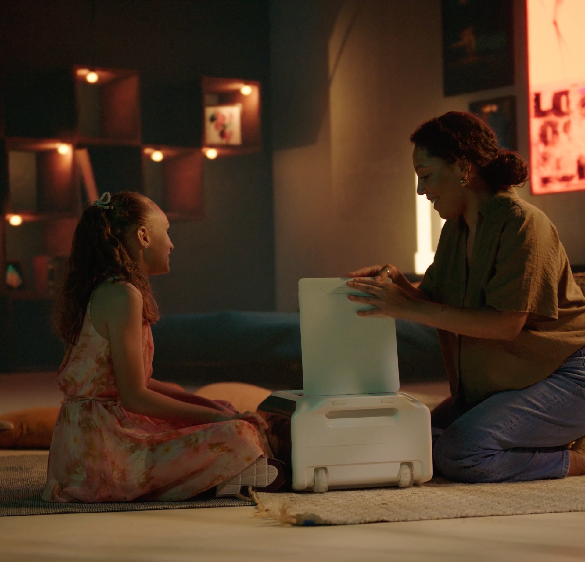 A child and parent packing Lugadoo together at home